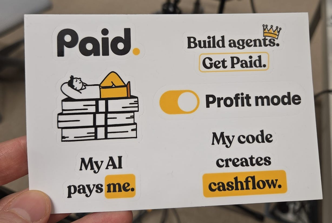 Sticker sheet with phrases: "Paid," "Build agents. Get Paid," "Profit mode," "My AI pays me," "My code creates cashflow," and an illustration of a person on money.
